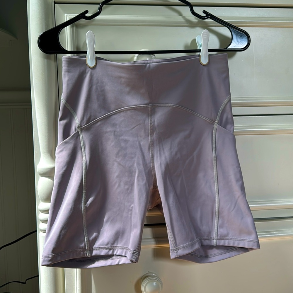 Lululemon lilac workout shorts with pockets